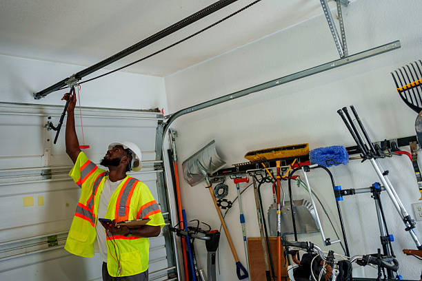 Professional Garage Door Panel Replacement technician working in Lamoille County County, VT